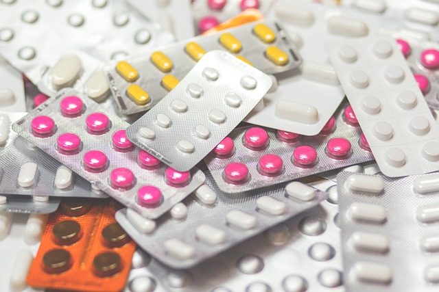 Various pills and tablets spread out on a table.