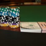 A poker table with money and chips.