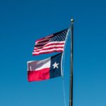 Texas flag waving in the wind.