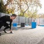 Athlete sprinting on basketball court.